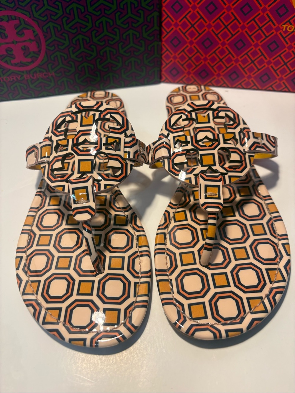 Tory Burch Geometric Printed Logo Thong Sandals in Beige, Mustard & Black